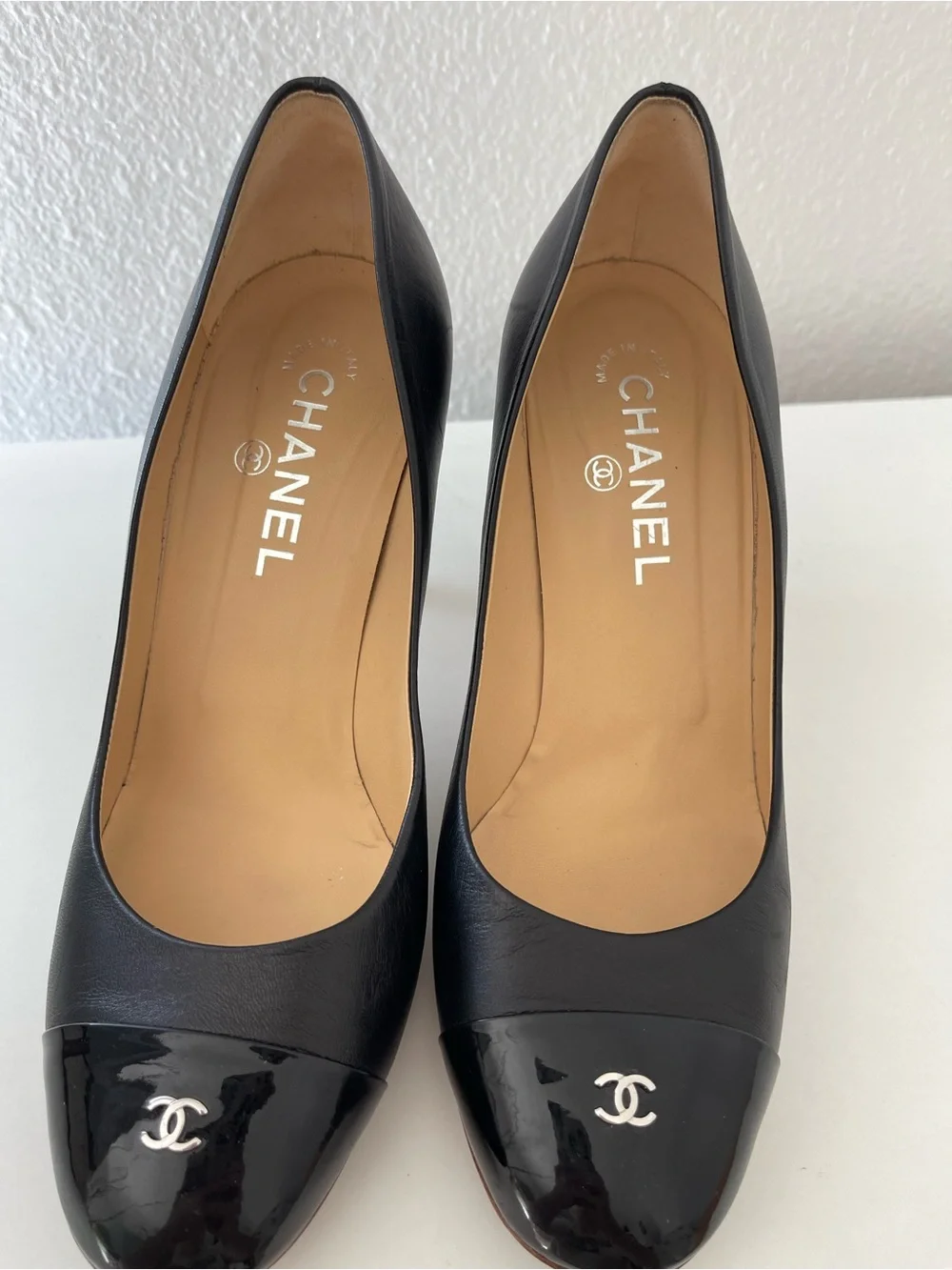 CHANEL Black Leather and Patent Cap-Toe Pump with CC Emblem